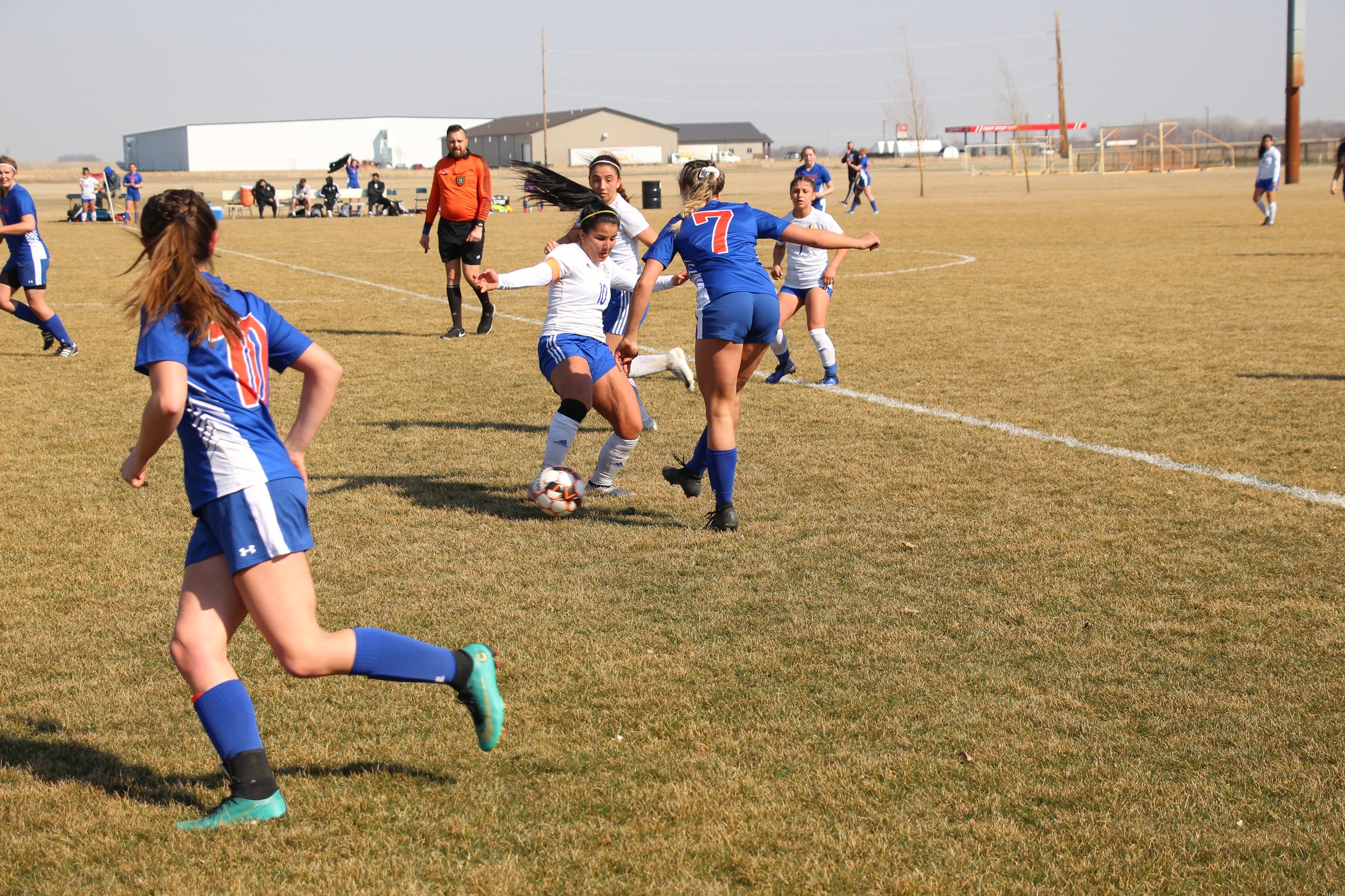 Sofia Hernandez puts in a tackle vs Hawkeye.