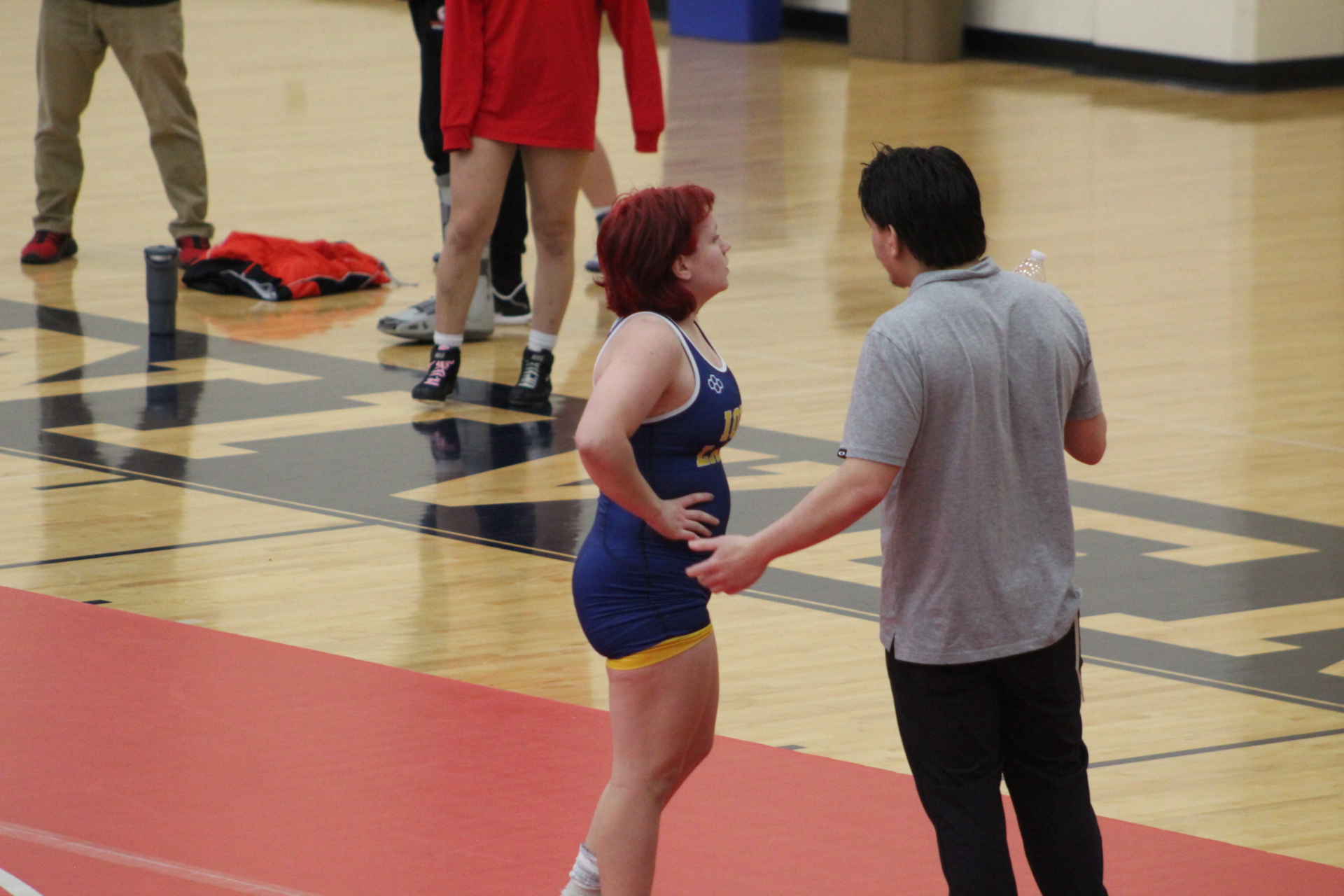 Battered Lakers Split Contested Matches With Hawkeye, Drop Dual